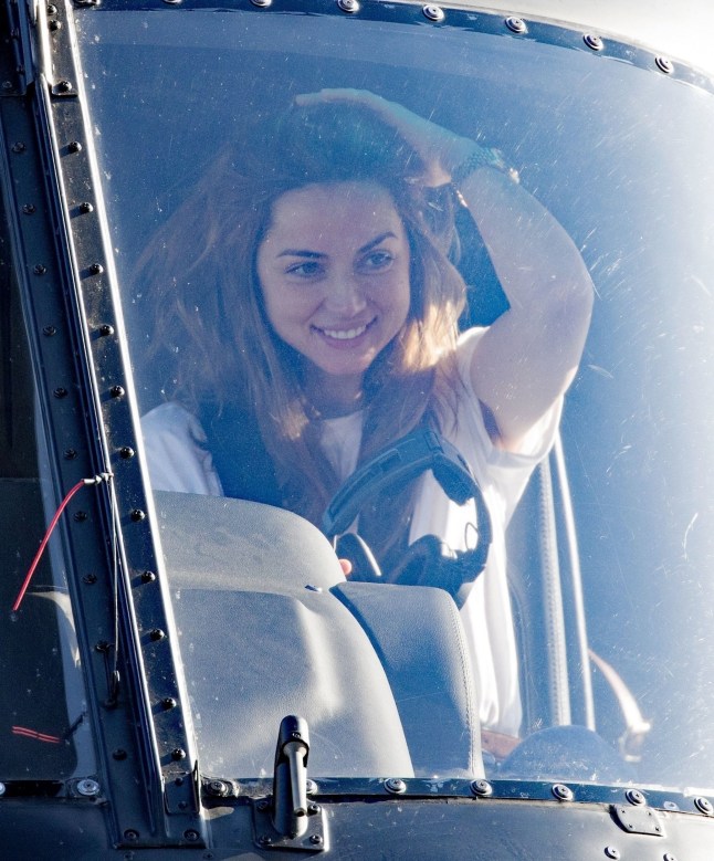 BGUK_3234031 - London, UNITED KINGDOM - *EXCLUSIVE* - Cuban-Spanish actress Ana de Armas pictured taking to the air in Tom Cruise's helicopter for a very short journey from London Heliport to Heathrow Airport this morning. While Tom is away promoting his latest movie, Ana has also during the week used Tom's helicopter and private jet during the week for an overnight return trip to Madrid. Pictured: Ana de Armas BACKGRID UK 10 MAY 2025 UK: +44 208 344 2007 / uksales@backgrid.com USA: +1 310 798 9111 / usasales@backgrid.com *Pictures Containing Children Please Pixelate Face Prior To Publication*