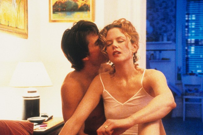 Tom Cruise kissing Nicole Kidman in a scene from the film 'Eyes Wide Shut', 1999. (Photo by Warner Brothers/Getty Images)
